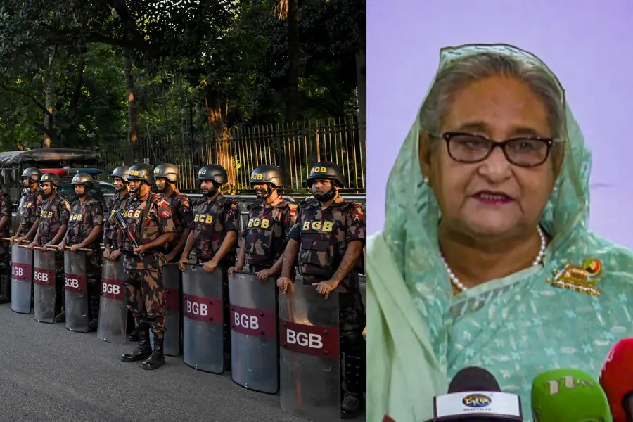 Border Guard Bangladesh (BGB) personnel stand guard along a road in Dhaka, Sheikh Hasina