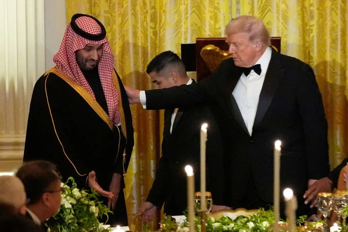 President Donald Trump and Saudi Arabia's Crown Prince Mohammed bin Salman are seated for a dinner in the East Room of the White House, Tuesday, Nov. 18, 2025 (Photo: AP)