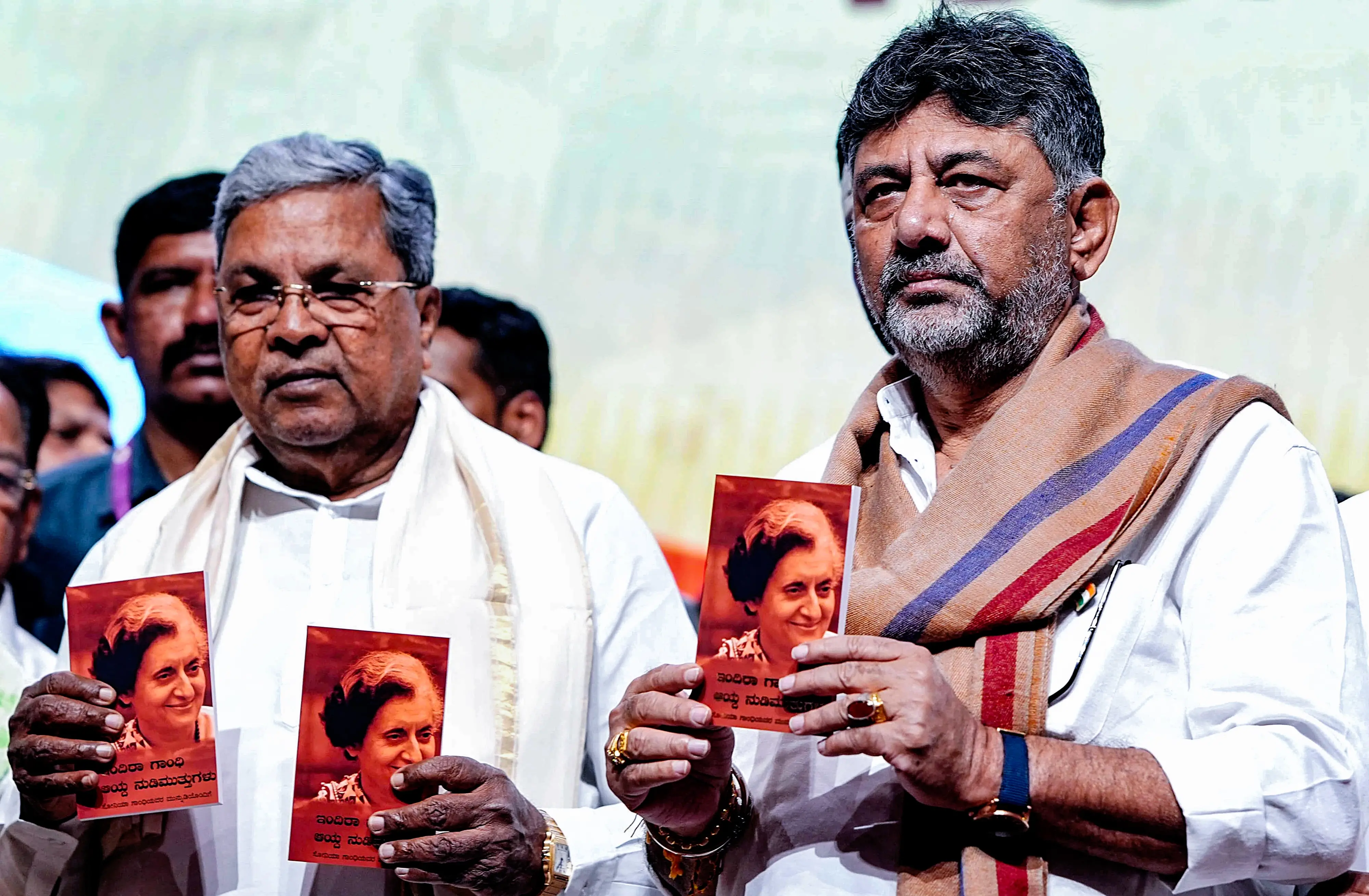 Karnataka Chief Minister Siddaramaiah and Deputy Chief Minister DK Shivakumar release Kannada version of book on former Prime Minister Indira Gandhi, written by Sonia Gandhi, on the occasion of her 108th birth anniversary | ANI