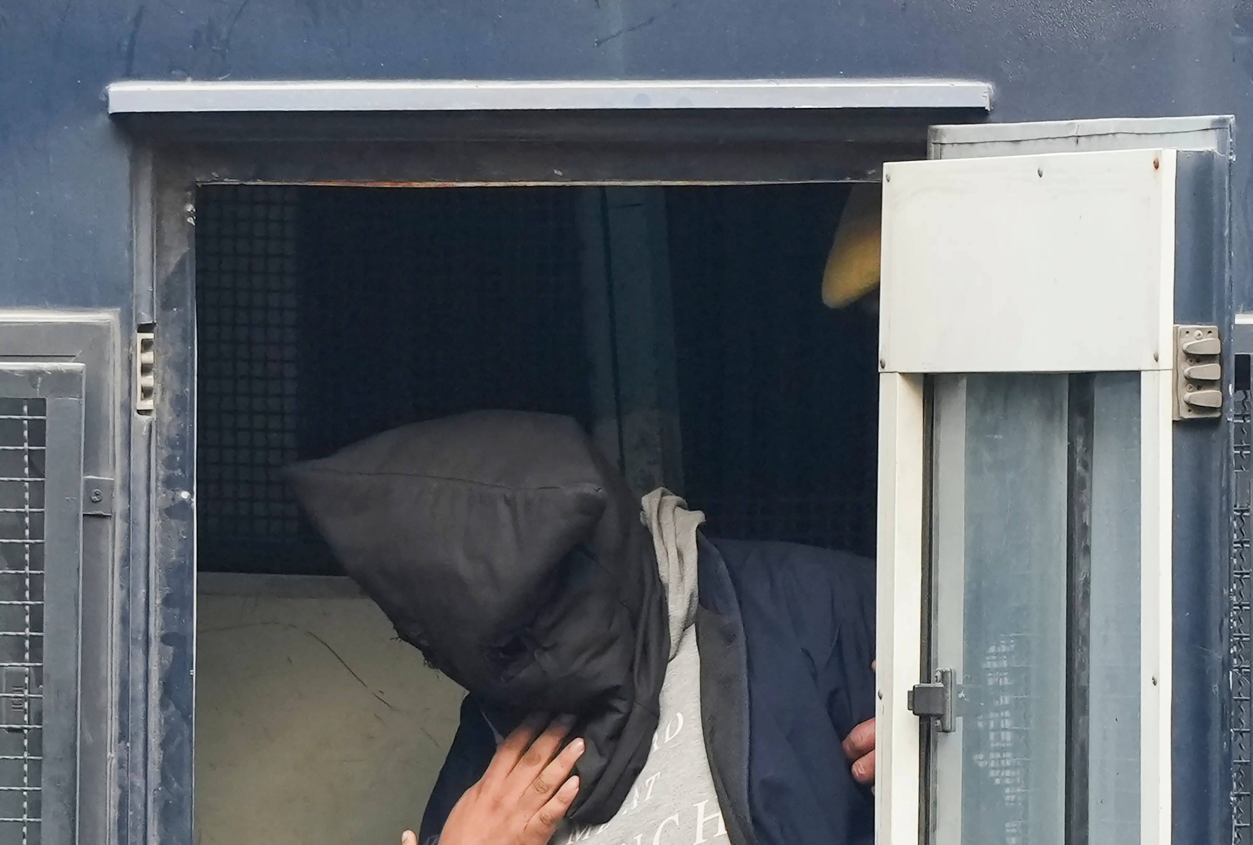An accused in the car bomb blast near Red Fort, face covered, being brought to the Patiala House Court, in New Delhi | PTI