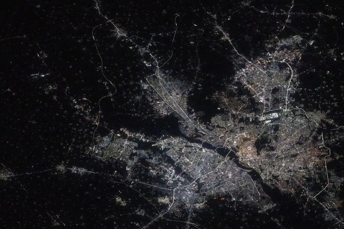 This nighttime view from the International Space Station, taken at approximately 10:54 p.m. local time, shows Delhi split by the Yamuna River | Photo: X/ International Space Station