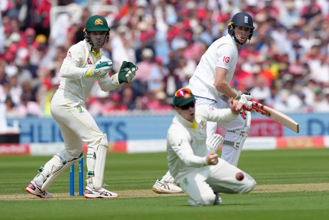 England's Zak Crawley watches as Australia's Steven Smith fails to stop the ball during the second day of the second Ashes Test cricket match at Lord's Cricket Ground | Photo: AP