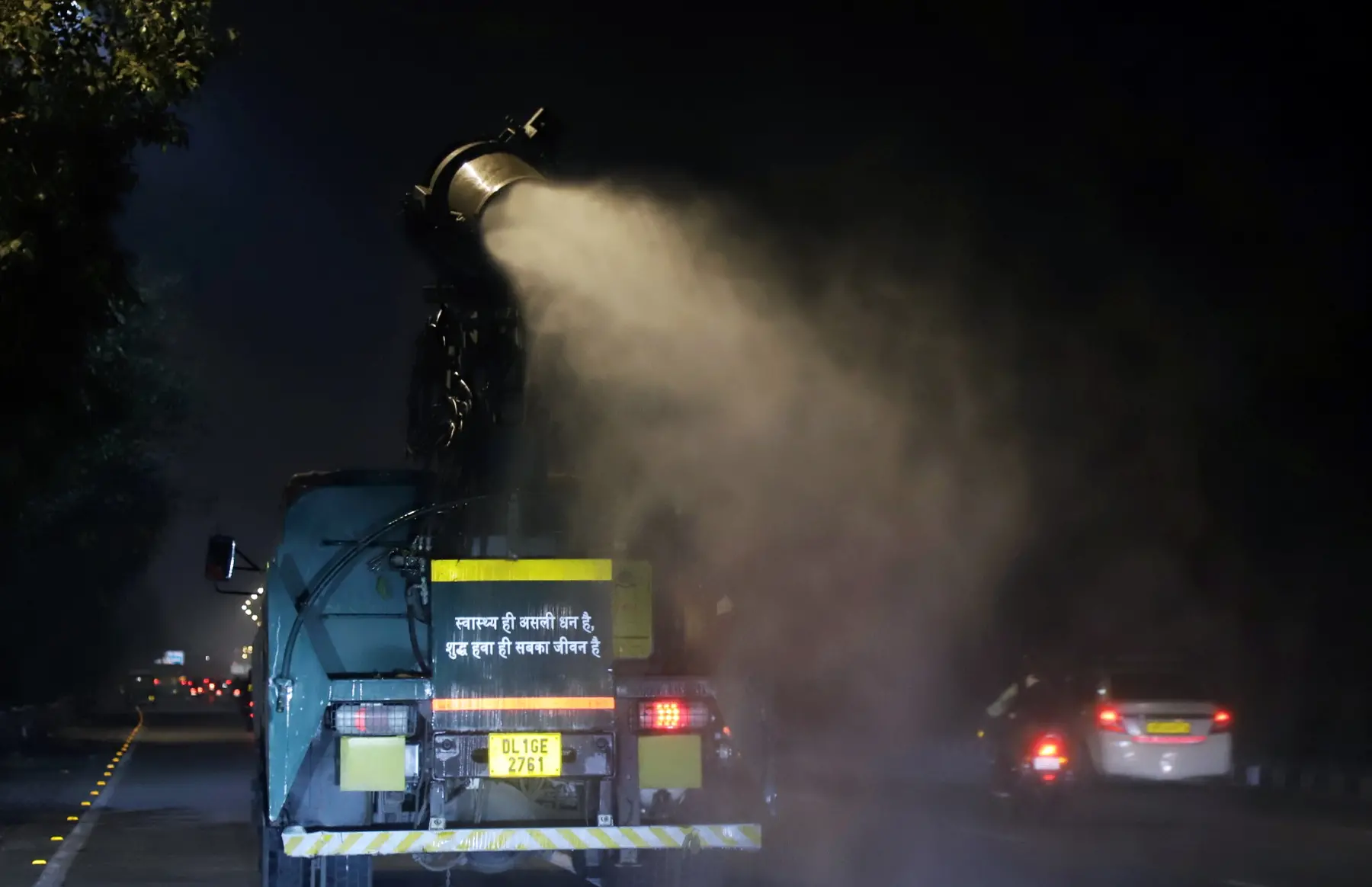 An anti-smog gun sprays water to curb the air pollution, in New Delhi on Saturday. | ANI