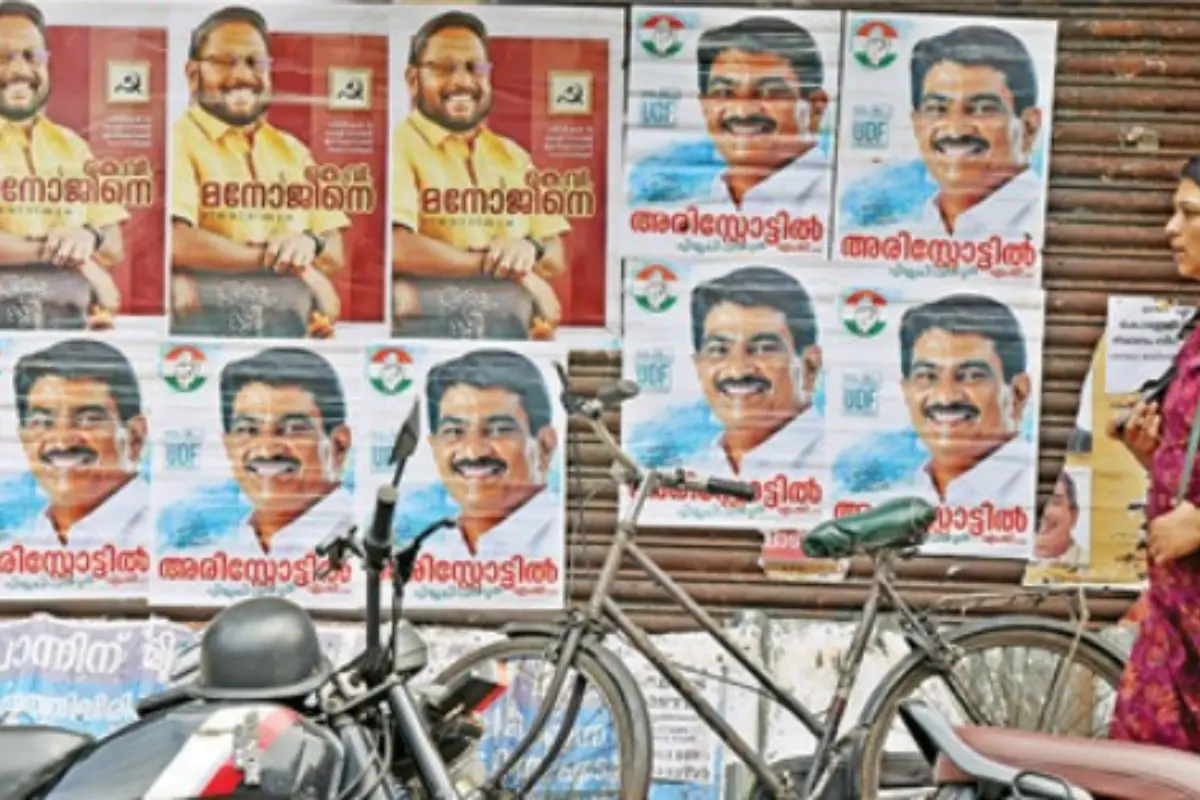Posters of both candidates in Kaloor