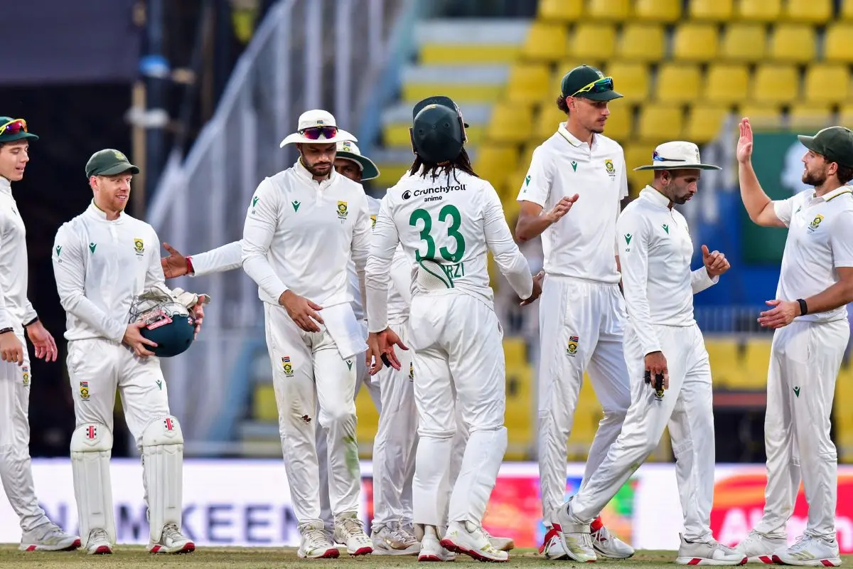 The South African team return to the pavilion after the end of the fourth day of the second test match against India, in Guwahati on Tuesday. (ANI Photo)