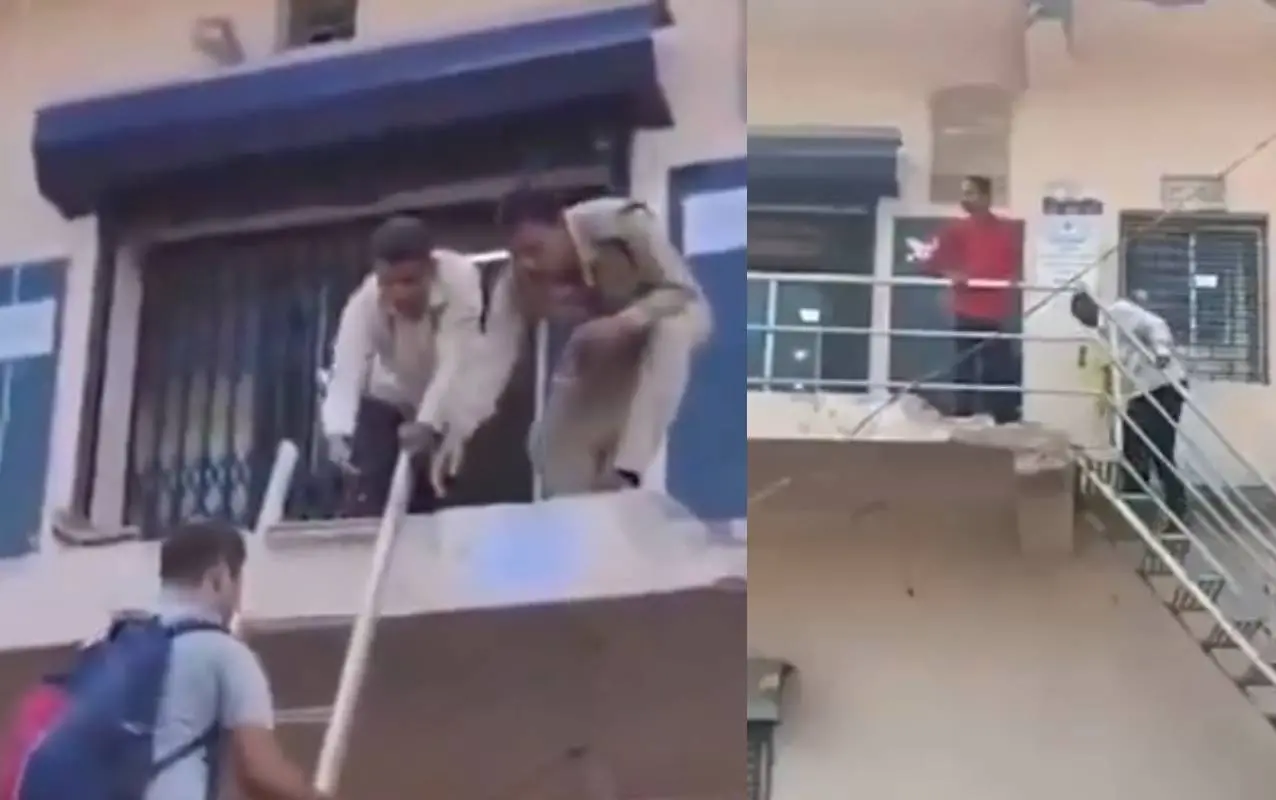 ഒന്നാം നിലയിലെ എസ്ബിഐ ഓഫീസിലേക്ക് ഏണി വഴി കയറുന്ന ഉപഭോക്താക്കൾ | Photo:X