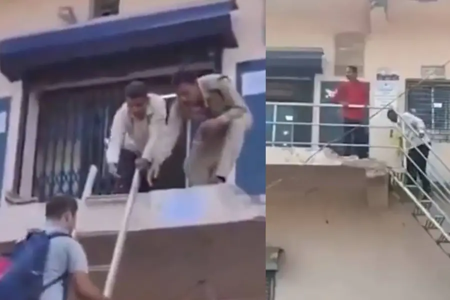 കെട്ടിടത്തിന്റെ മുൻഭാഗവും പടിക്കെട്ടും പൊളിച്ചുമാറ്റി അധികൃതർ, ബാങ്കിലെത്താൻ ഏണിവെച്ച് കയറി ജനങ്ങൾ | വീഡിയോ