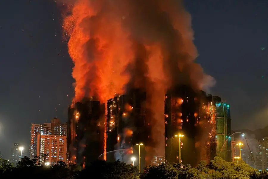 Hong Kong FireThick smoke and flames rise as a major fire engulfs several apartment blocks at the Wang Fuk Court residential estate in Hong Kong's Tai Po district