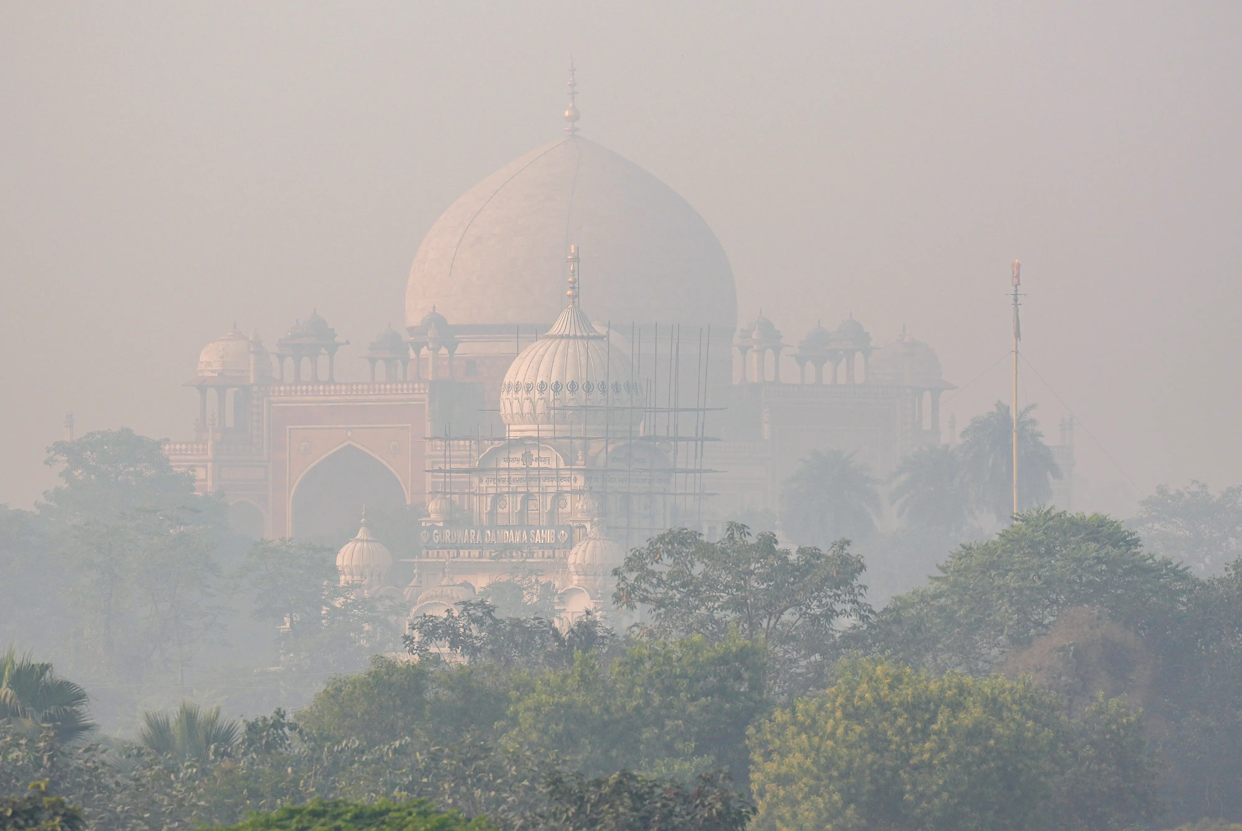 Humayun's Tomb engulfed in a layer of smog, in New Delhi. | Photo: ANI
