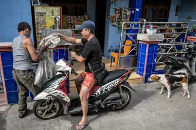 ‘God created it to be eaten’ Why Jakarta’s dog meat ban has locals divided