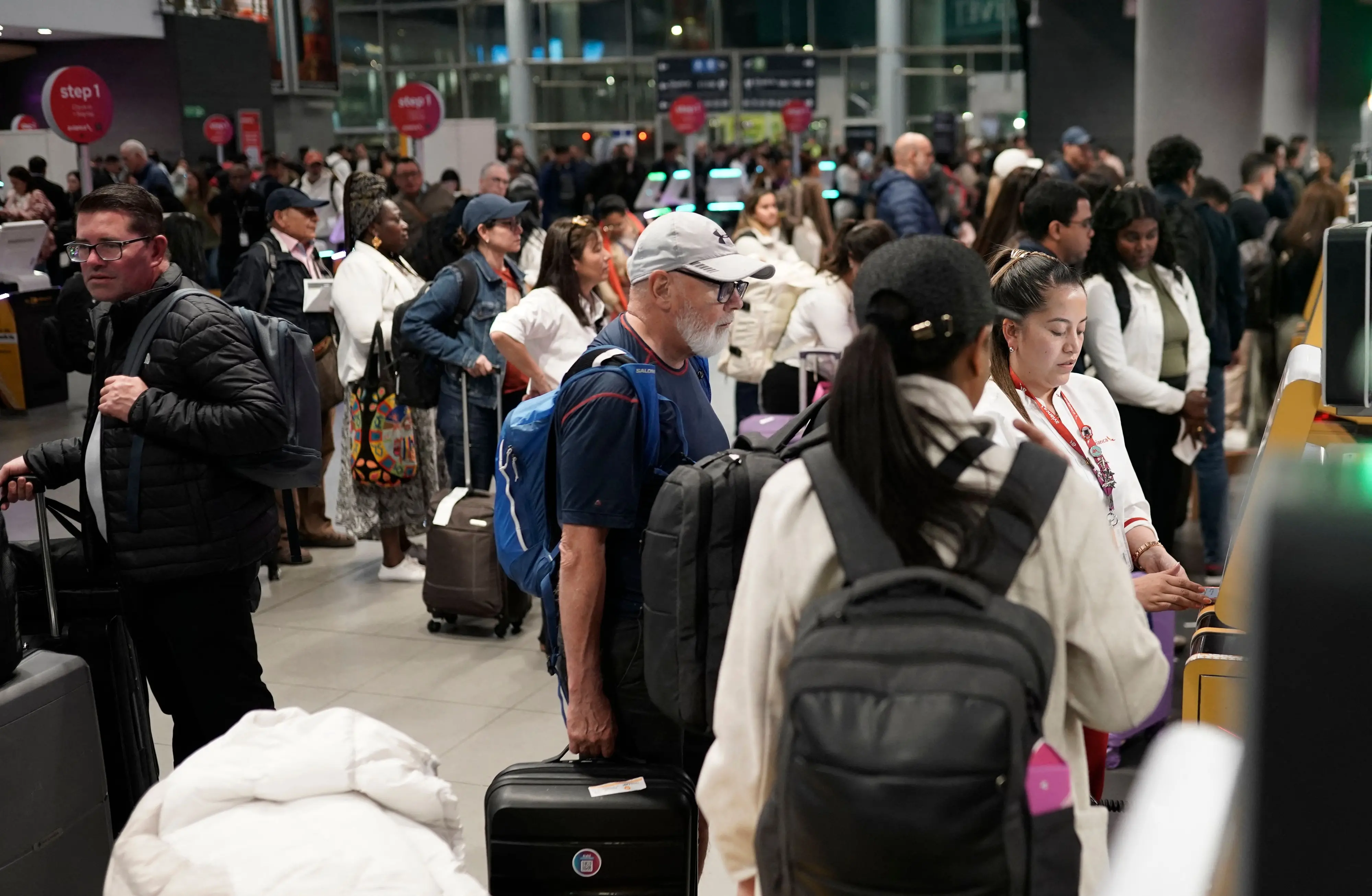 Passengers are pictured at El Dorado airport in Bogota on November 28, 2025. Colombian airline Avianca reported on Friday "significant" disruptions to its flights due to a required Airbus software update affecting 70 percent of the company's fleet. | AFP