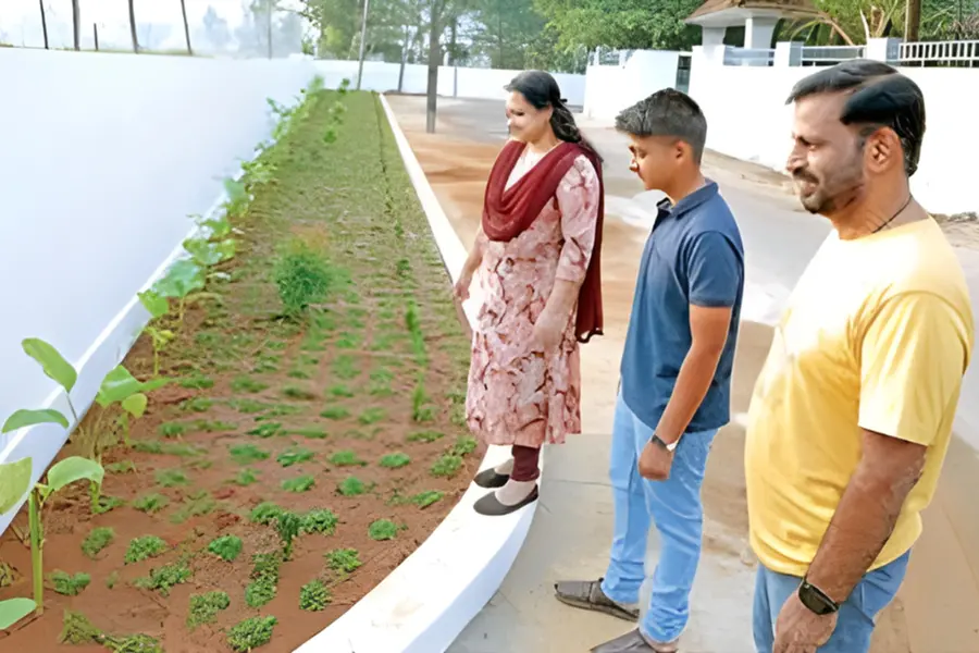 Nileshwaram couple Nisha and Sunil convert a garbage dump near Ramaram road into a beautiful public garden and open library