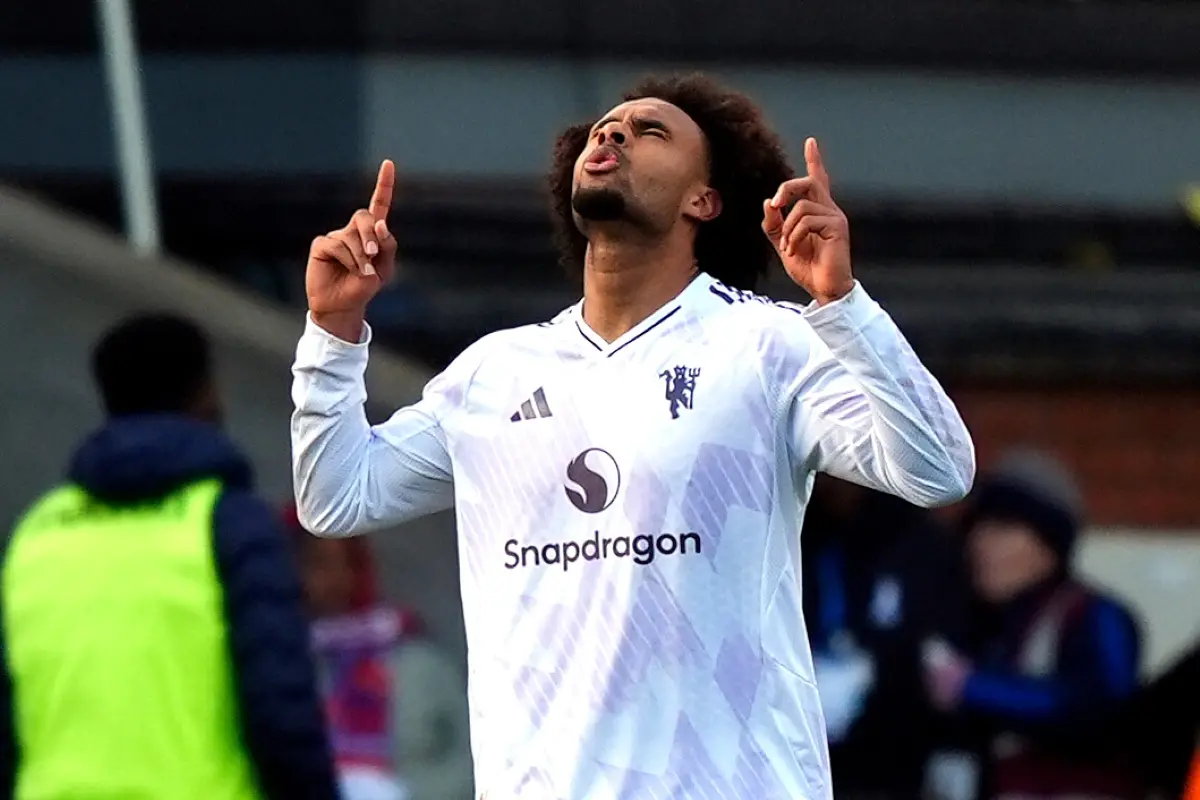 Manchester United's Joshua Zirkzee celebrates scoring during the English Premier League soccer match between Crystal Palace and Manchester United in London. | Photo: AFP