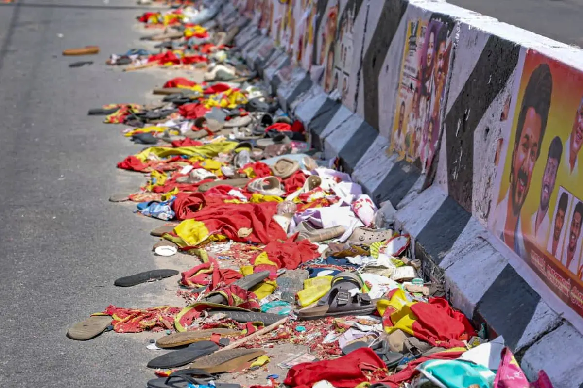 Footwear and other belongings of people lie on a road in the aftermath of stampede during a rally of actor and Tamilaga Vetri Kazhagam (TVK) chief Vijay | File Photo: PTI