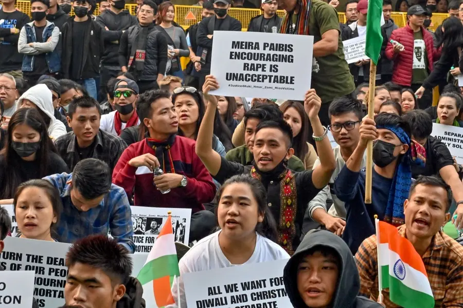 Members of the 'Zo United' shout slogans during a nationwide rally demanding a separate administration for the Kuki-Zo tribes in Manipur
