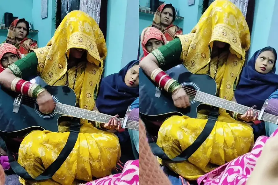 മുഖംമറച്ച് നവവധുവിന്റെ ഗിറ്റാര് വായന; വൈറലായി വീഡിയോ, ചര്ച്ചയാക്കി സോഷ്യല്മീഡിയ