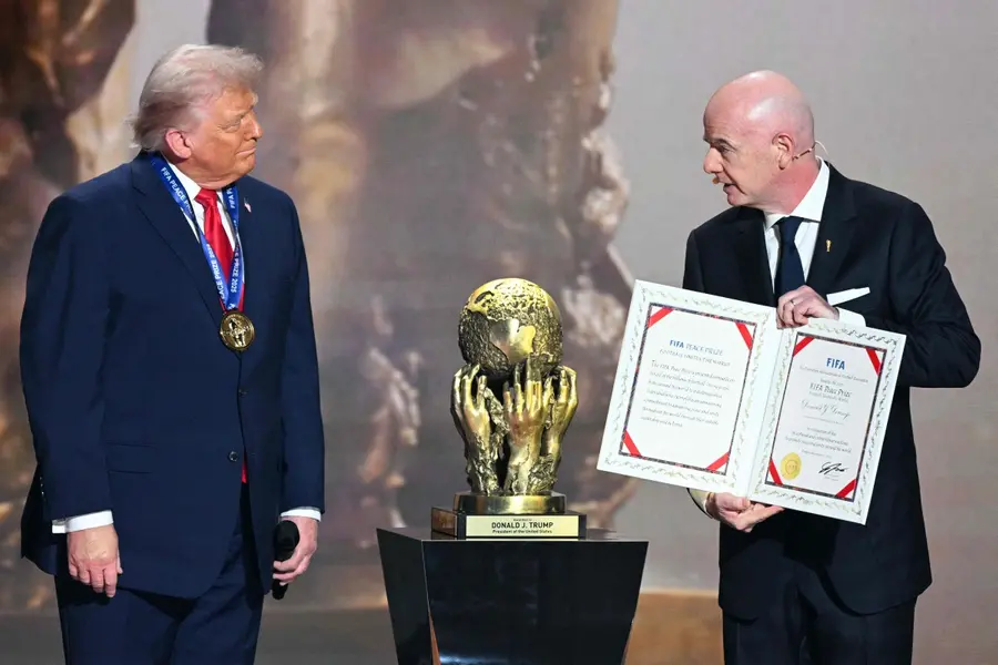 ‘For efforts to unite people, bringing hope for future generations’: FIFA honours Trump with peace prize during World Cup draw