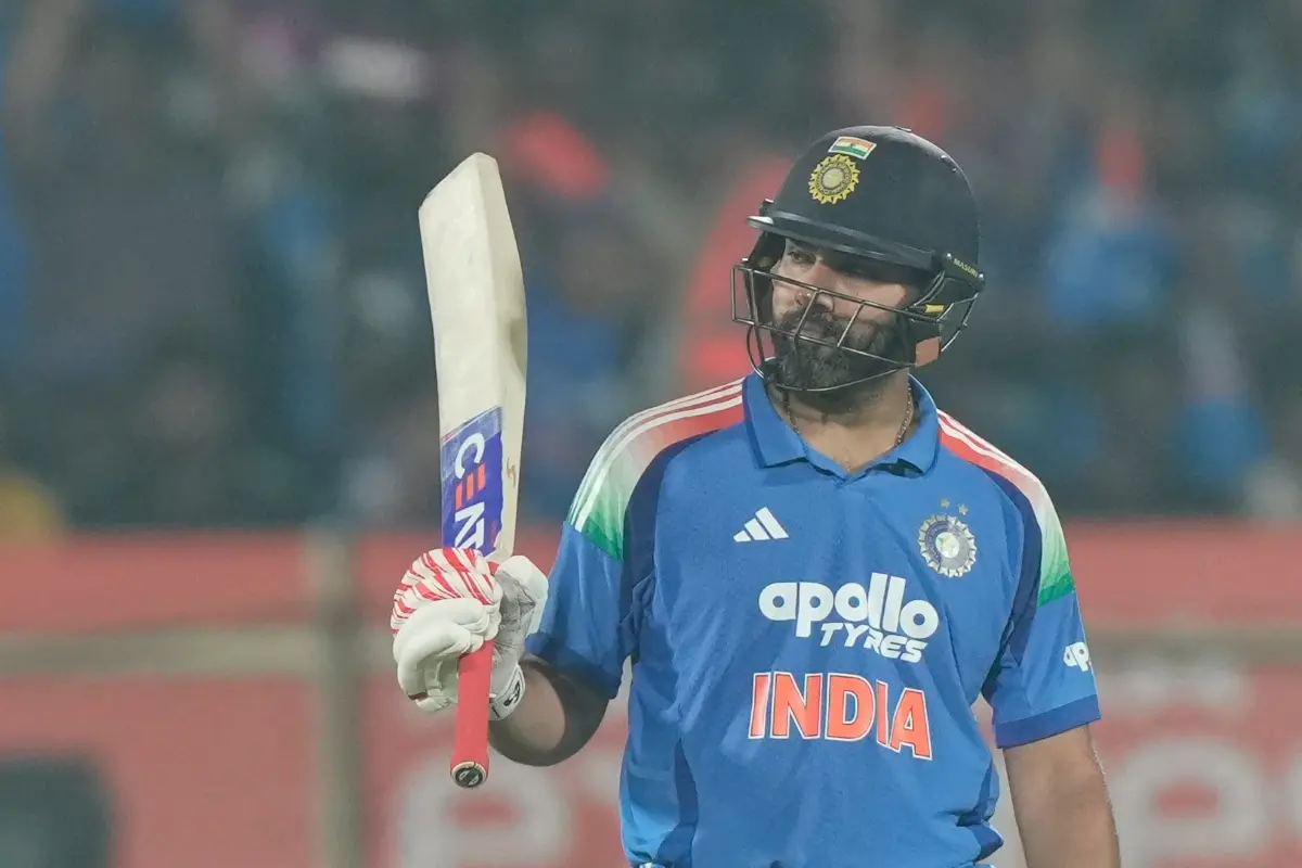 Rohit Sharma celebrates his fifty runs during the third One Day International cricket match between India and South Africa in Visakhapatnam. | Photo: AP