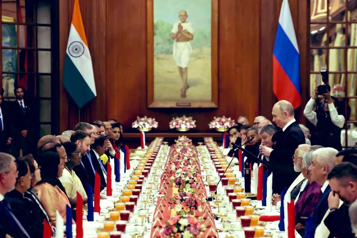A wide view of the state banquet held at Rashtrapati Bhavan during Russian President Vladimir Putin's India visit, featuring an elaborate dining setup, ceremonial decor and delegates from both nations engaging in formal interactions. Photo: X