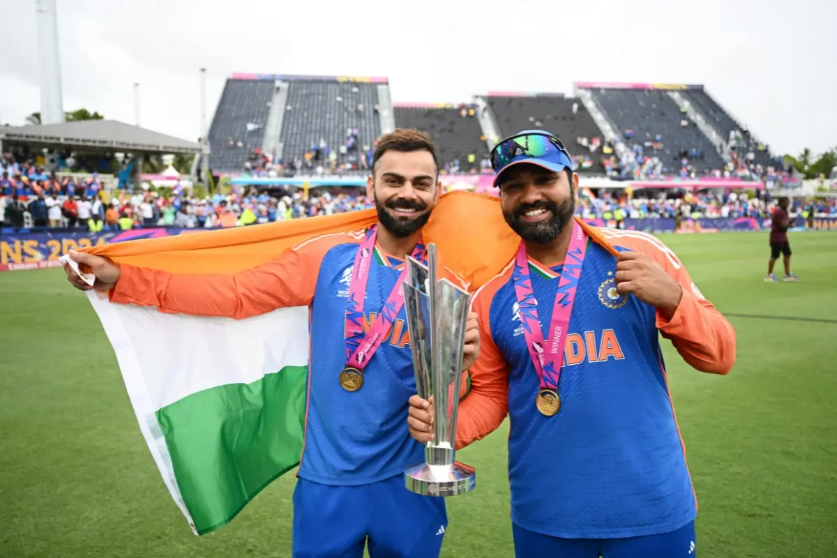 File Photo: Virat Kohli and Rohit Sharma of India celebrates with the ICC Men's T20 Cricket World Cup following the ICC Men's T20 Cricket World Cup West Indies & USA 2024 Final match |  Gareth Copley/Getty Images