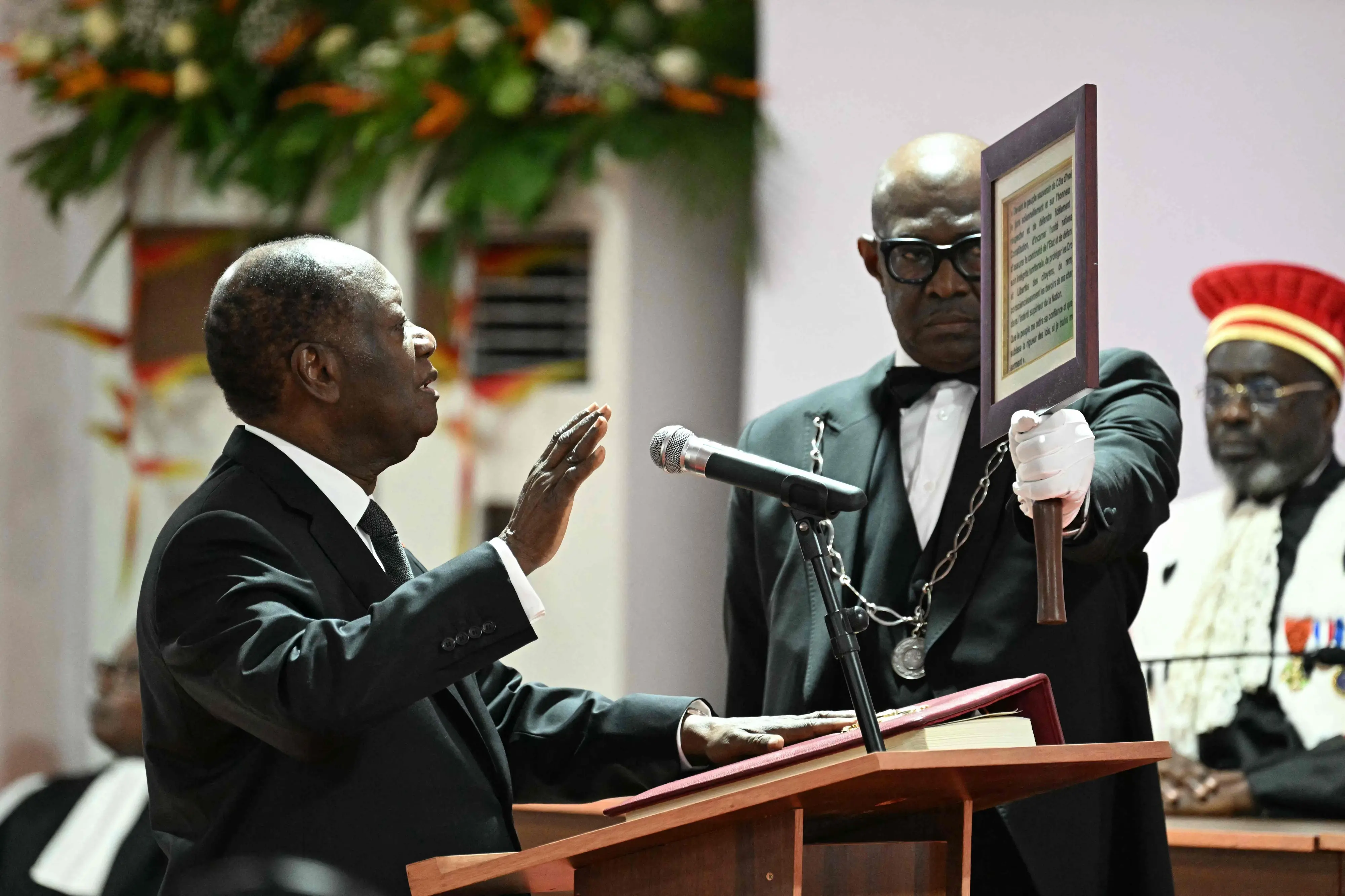 Ivory Coast President Alassane Ouattara is sworn in at the Presidential Palace in Abidjan | Photo: AFP
