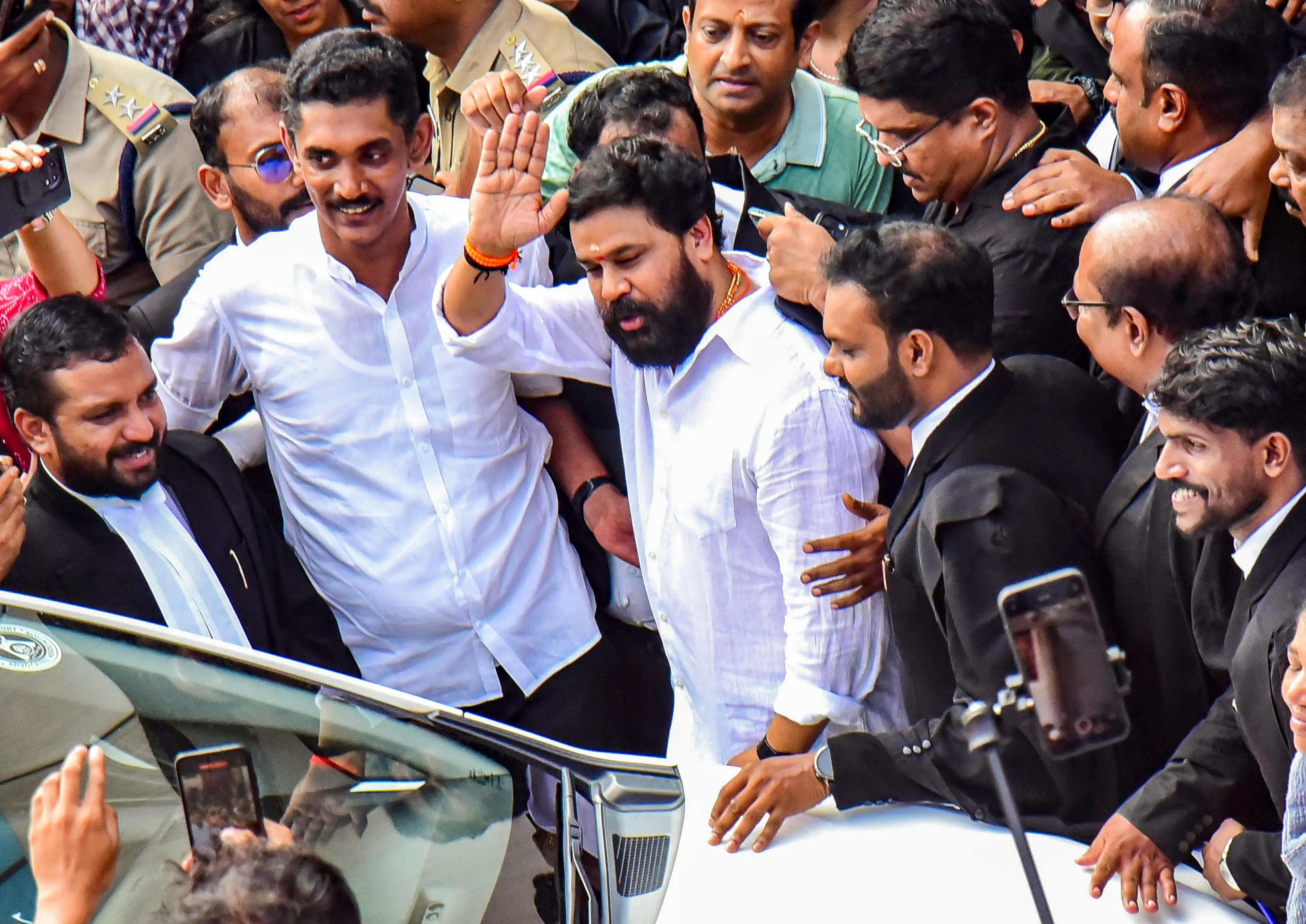 Malayalam actor Dileep leaves the Ernakulam district court following his acquittal in the 2017 sexual assault case involving a south Indian actress, in Kochi, Kerala, Monday, Dec. 8, 2025.| Photo: PTI