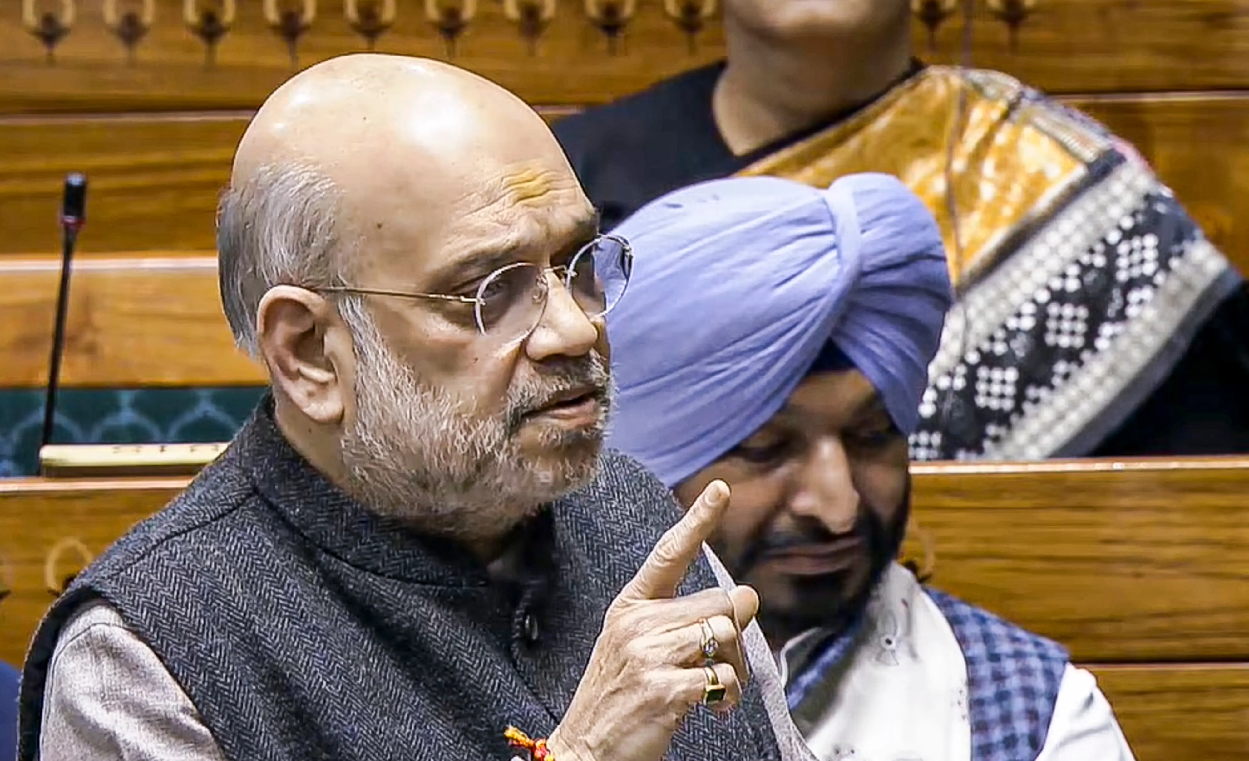 Union Home Minister Amit Shah speaks in the Lok Sabha during the Winter session of Parliament | Photo: PTI
