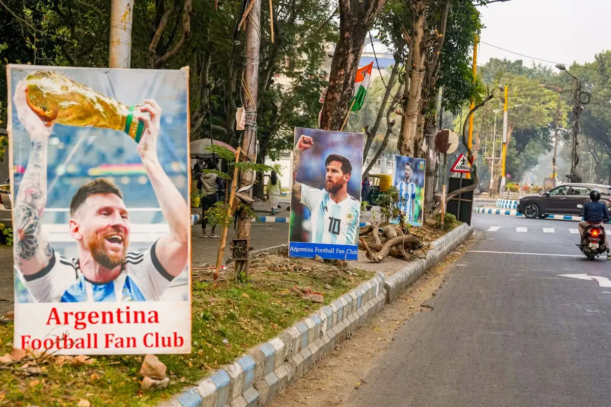 Posters of Messi along a roadside ahead of his 'GOAT Tour India 2025' at the Vivekananda Yuba Bharati Krirangan stadium, in Kolkata, Wednesday, Dec. 10, 2025. (PTI Photo/Swapan Mahapatra)