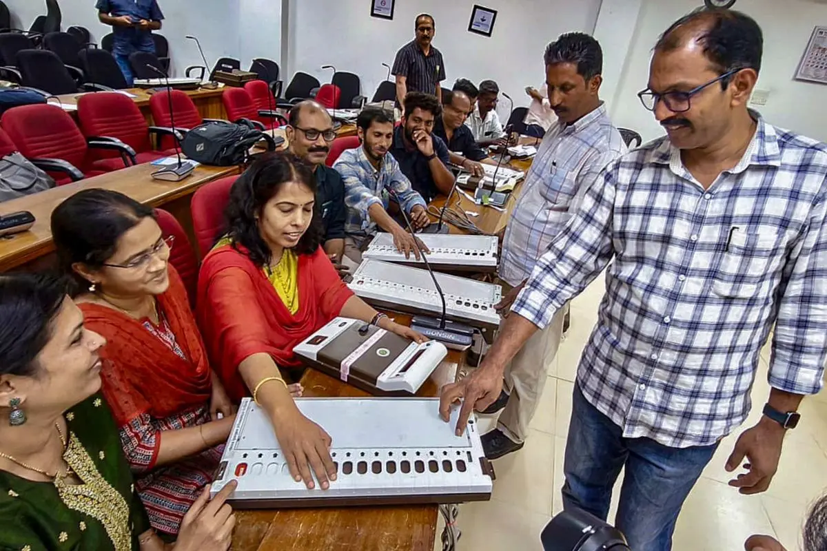 Polling officials attend an Electronic Voting Machine (EVM) operation training session at the Collectorate Conference Hall in Kozhikode | File photo: PTI