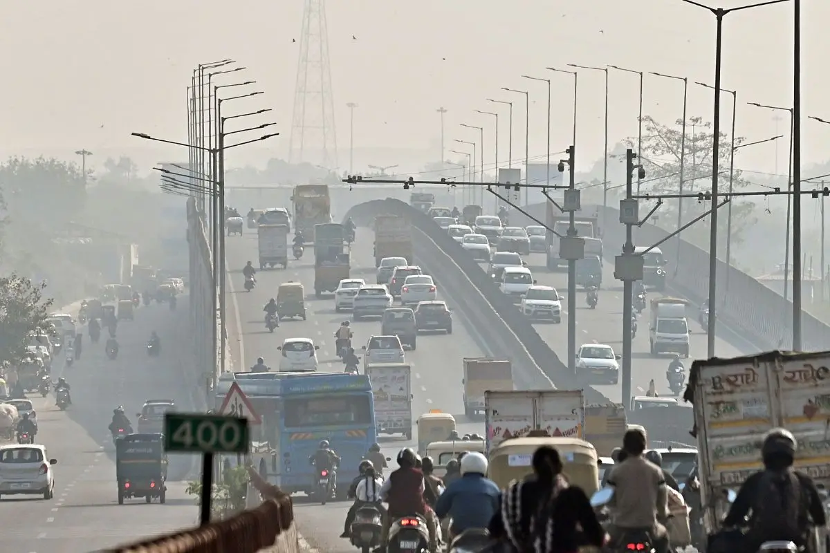 Commuters travel amidst heavy smog as pollution level deteriorates, in New Delhi. (ANI Photo/Sumit)