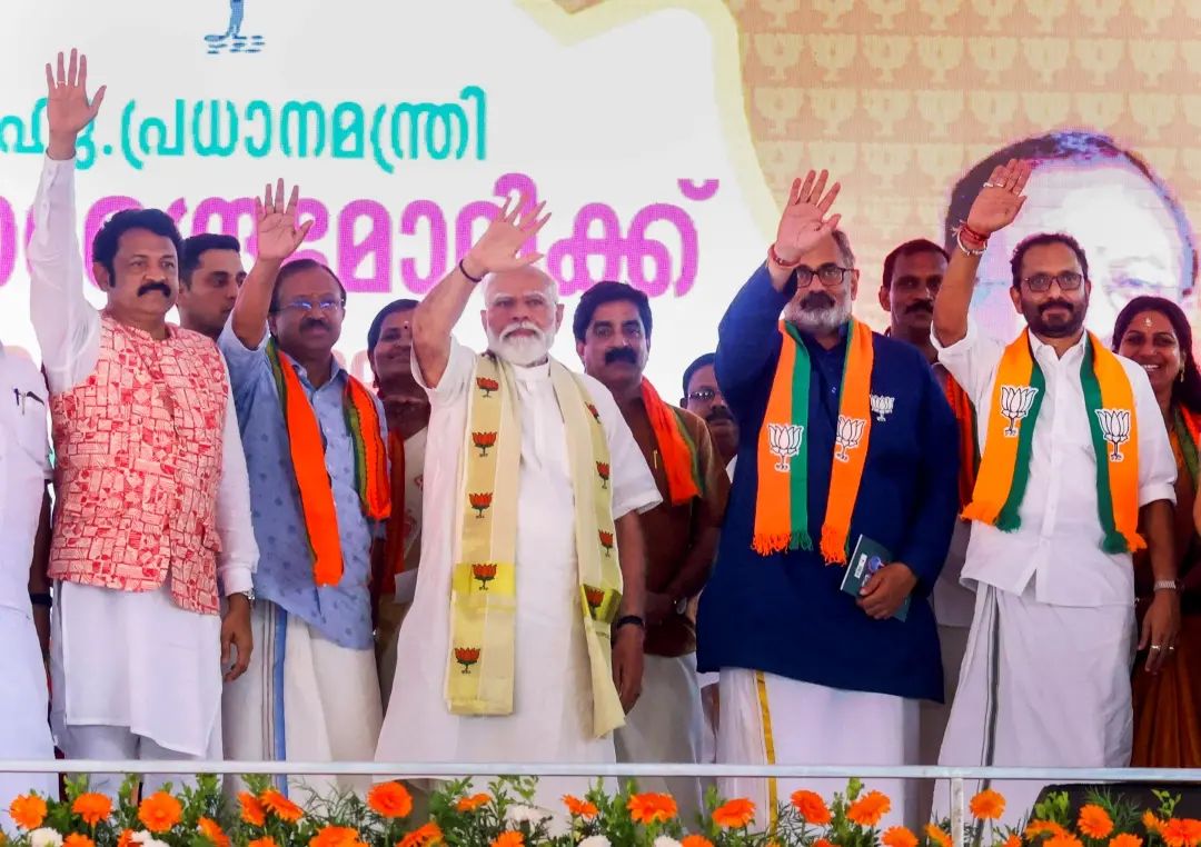 PM Narendra Modi with BJP leaders V Muraleedharan, Rajeev Chandrasekhar and K. Surendran during a public meeting ahead of Lok Sabha elections | PTI