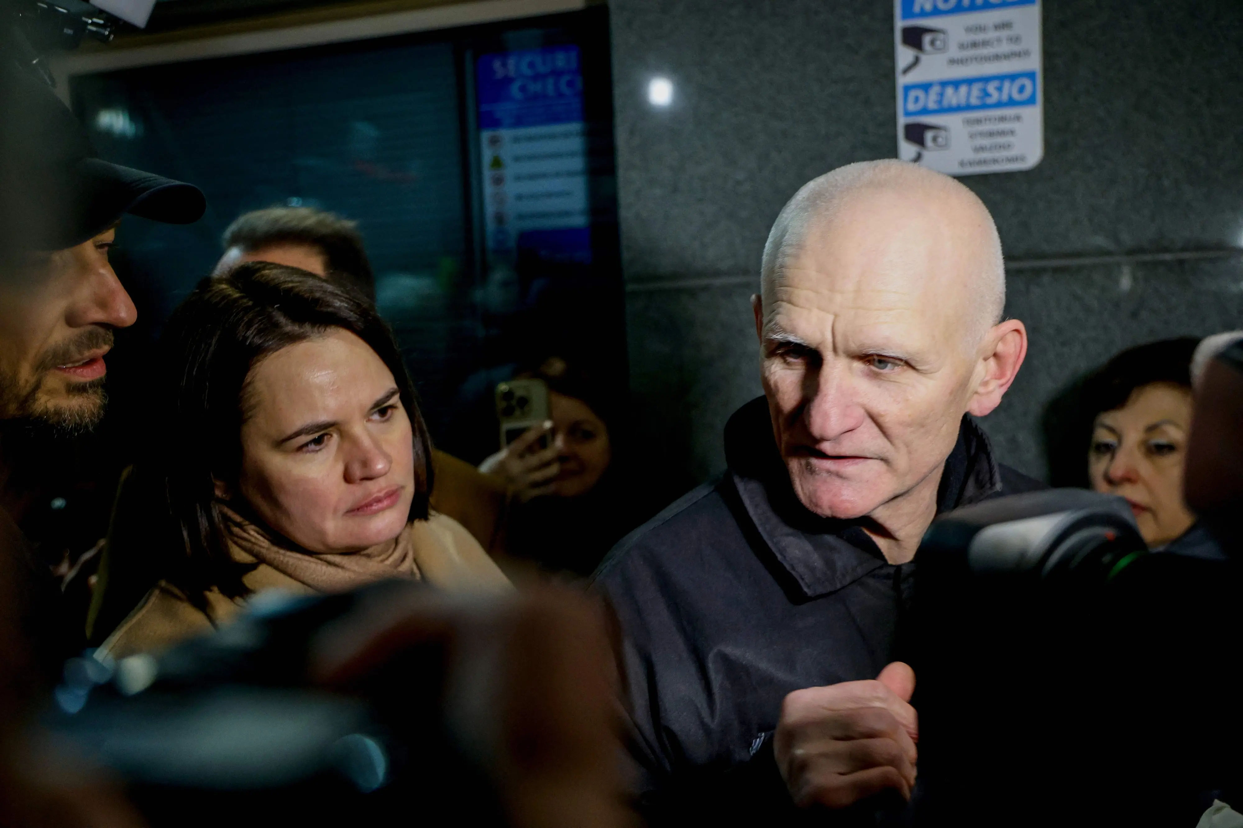 Belarusian Nobel Prize winner Ales Bialiatski (R) speaks to journalists next to Belarusian opposition leader and political activist Sviatlana Tsikhanouskaya (L) at the US embassy after he was released in Vilnius, Lithuania | Photo: AFP