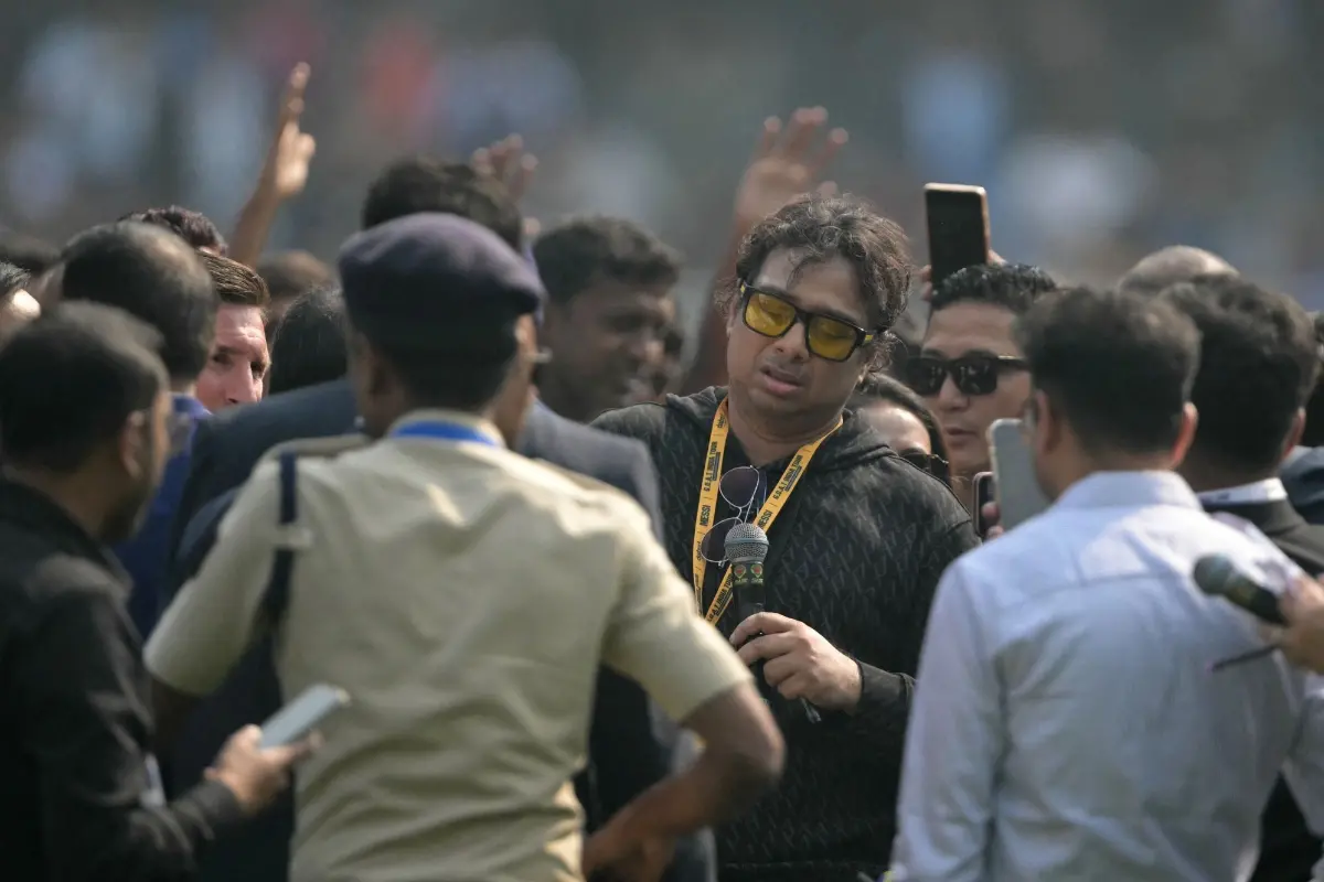 Organiser of Lionel Messi's GOAT Tour of India, Satadru Dutta (Centre R) speaks at the Salt Lake Stadium in Kolkata on December 13, 2025 | Photo: AFP