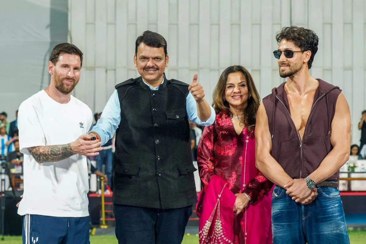 Argentine football superstar Lionel Messi, left, Maharashtra Chief Minister Devendra Fadnavis, second left, Bollywood actor Tiger Shroff, right, and others during an event as part of the 'GOAT India Tour 2025', at the Wankhede Stadium in Mumbai. | Photo: PTI