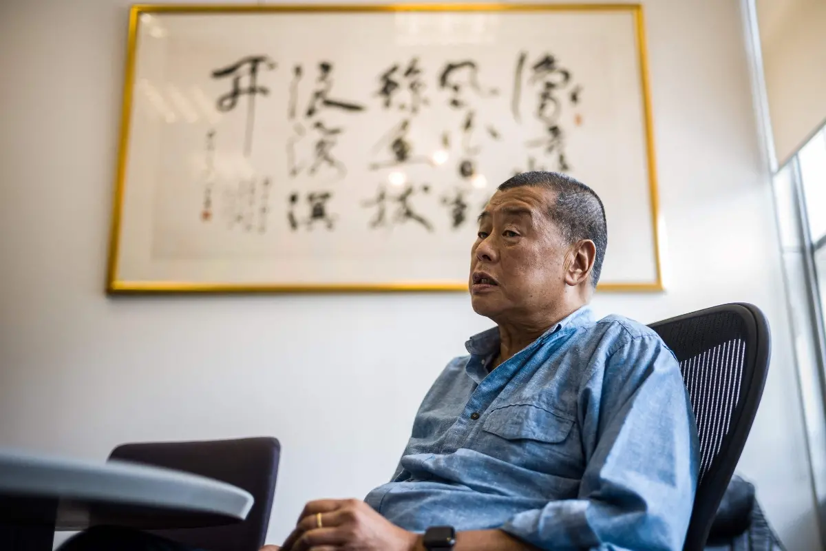 File Photo: Media tycoon Jimmy Lai speaks during an interview | AFP