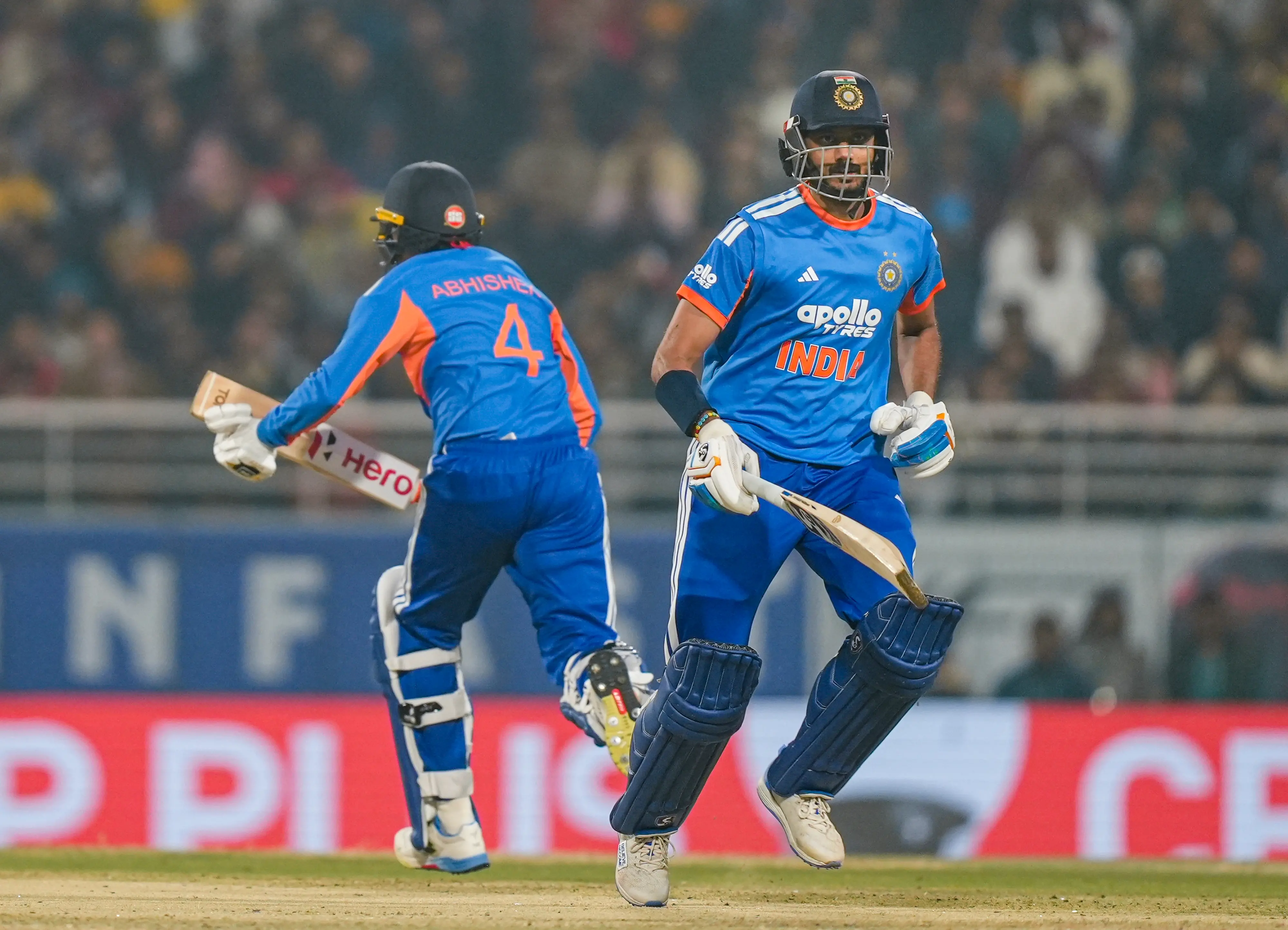 India's Axar Patel, right, and Abhishek Sharma run between the wickets during the second T20 International cricket match of a series between India and South Africa | Photo: PTI