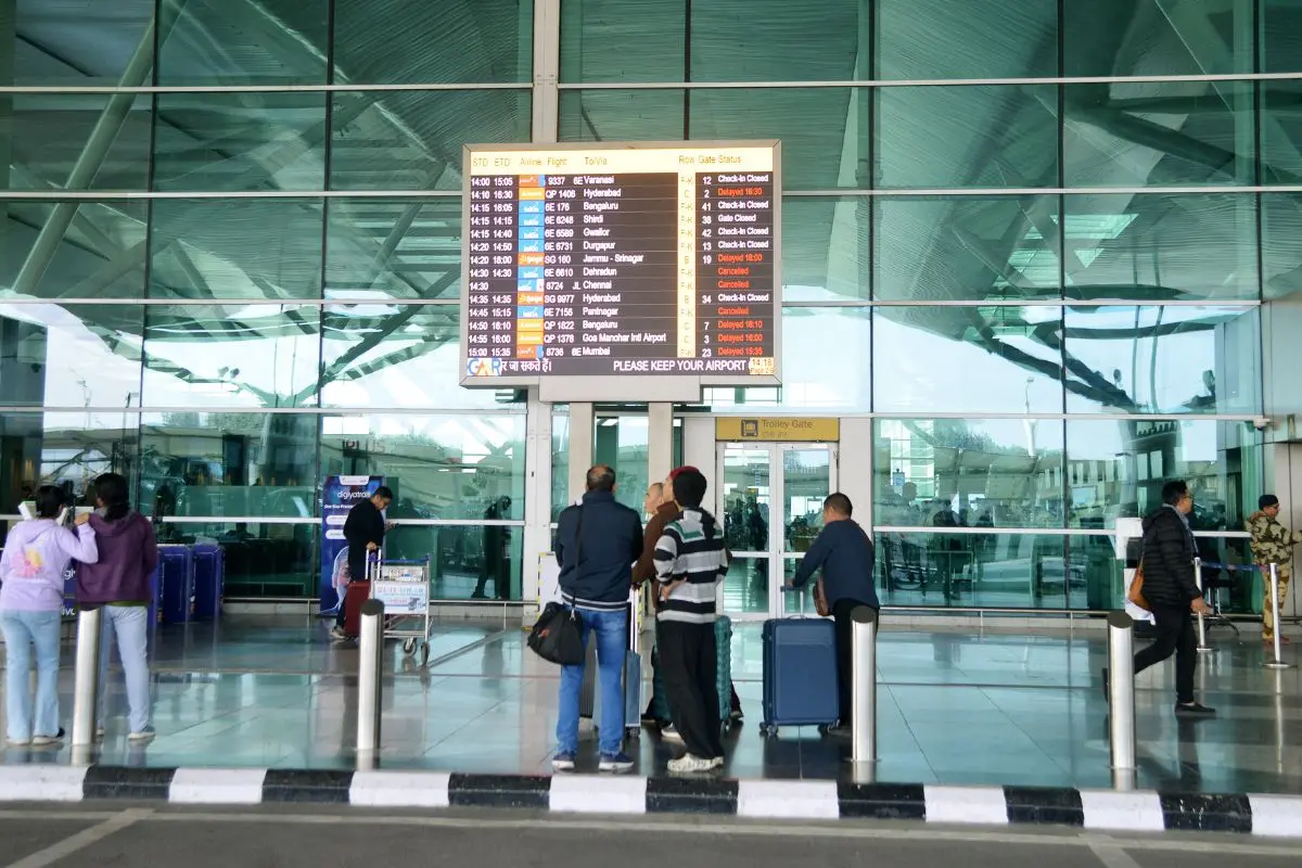 Passengers wait at Terminal 1 of the Indira Gandhi International Airport as IndiGo's flight disruptions continue nationwide, in New Delhi. (ANI Photo)