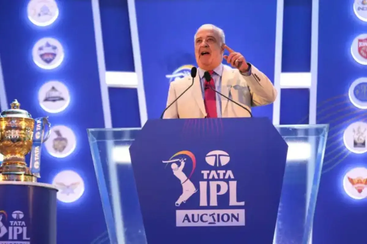 IPL franchise officials raise paddles during the IPL 2026 mega auction as teams engage in intense bidding wars for players, with several high-priced buys sparking debate over value and team balance. Photo: Official site