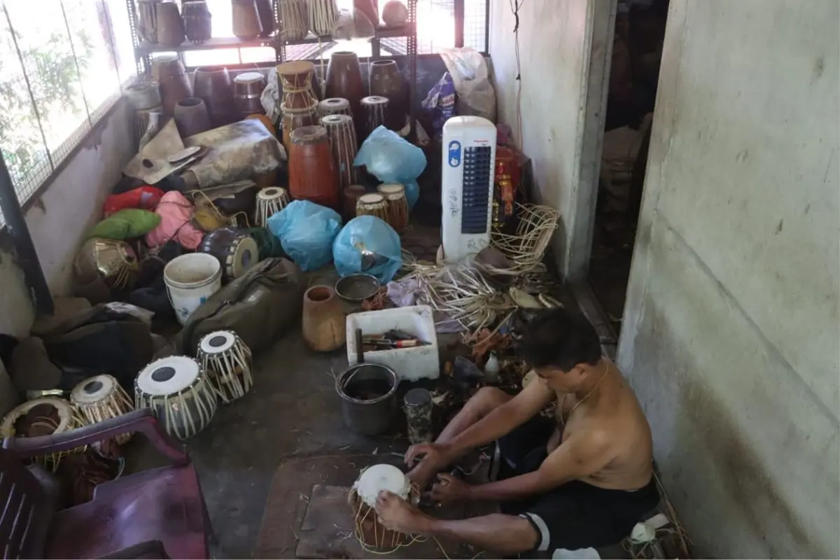 Raju making tabla