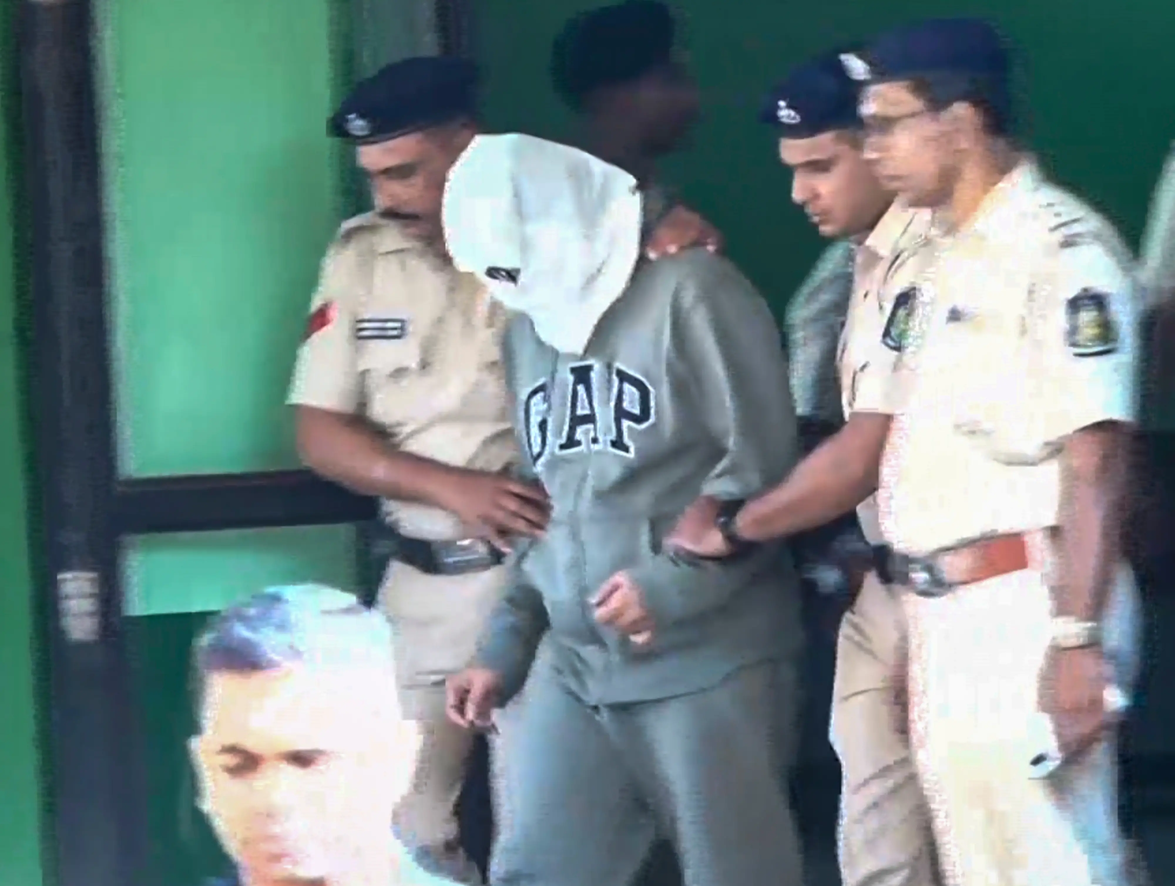 One of the Luthra brothers, co-owners of the Birch by Romeo Lane nightclub, being taken by police personnel to a court in connection with the December 6 fire incident that killed 25 persons | PTI