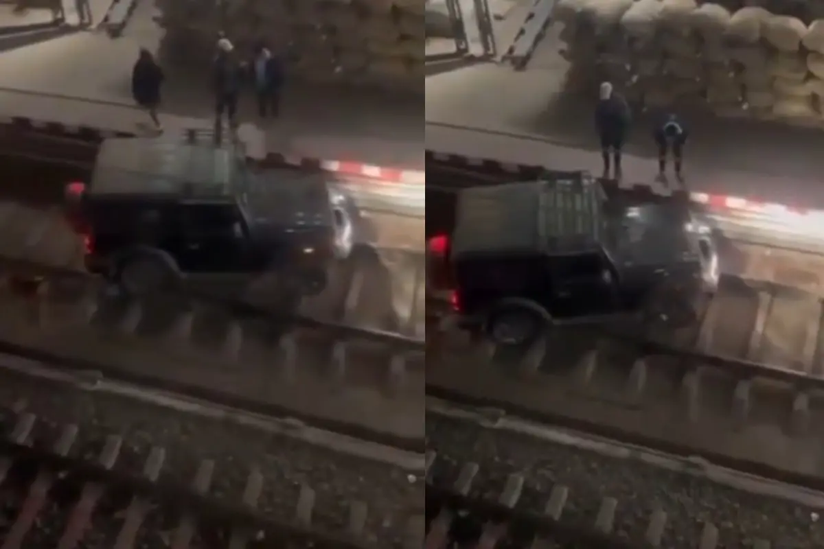 Mahindra Thar stuck on Dimapur railway tracks | Photo: Viral video screengrab.