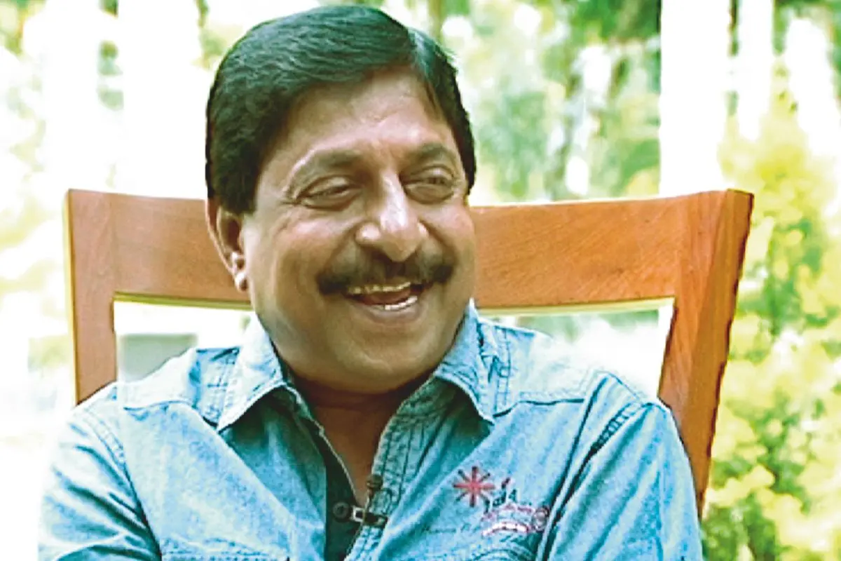 Sreenivasan smiles in an undated photograph, a moment that captures the warmth, wit, and humanity he brought to Malayalam cinema for nearly five decades. Photo: MBI