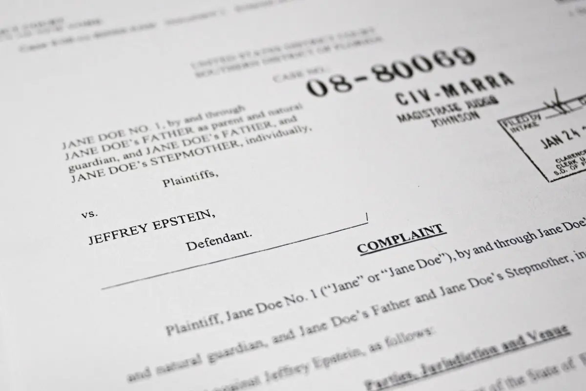 This photo illustration taken in Washington, DC, on December 19, 2025 shows a court document after the US Justice Department began releasing the long-awaited records (Photo: AFP)