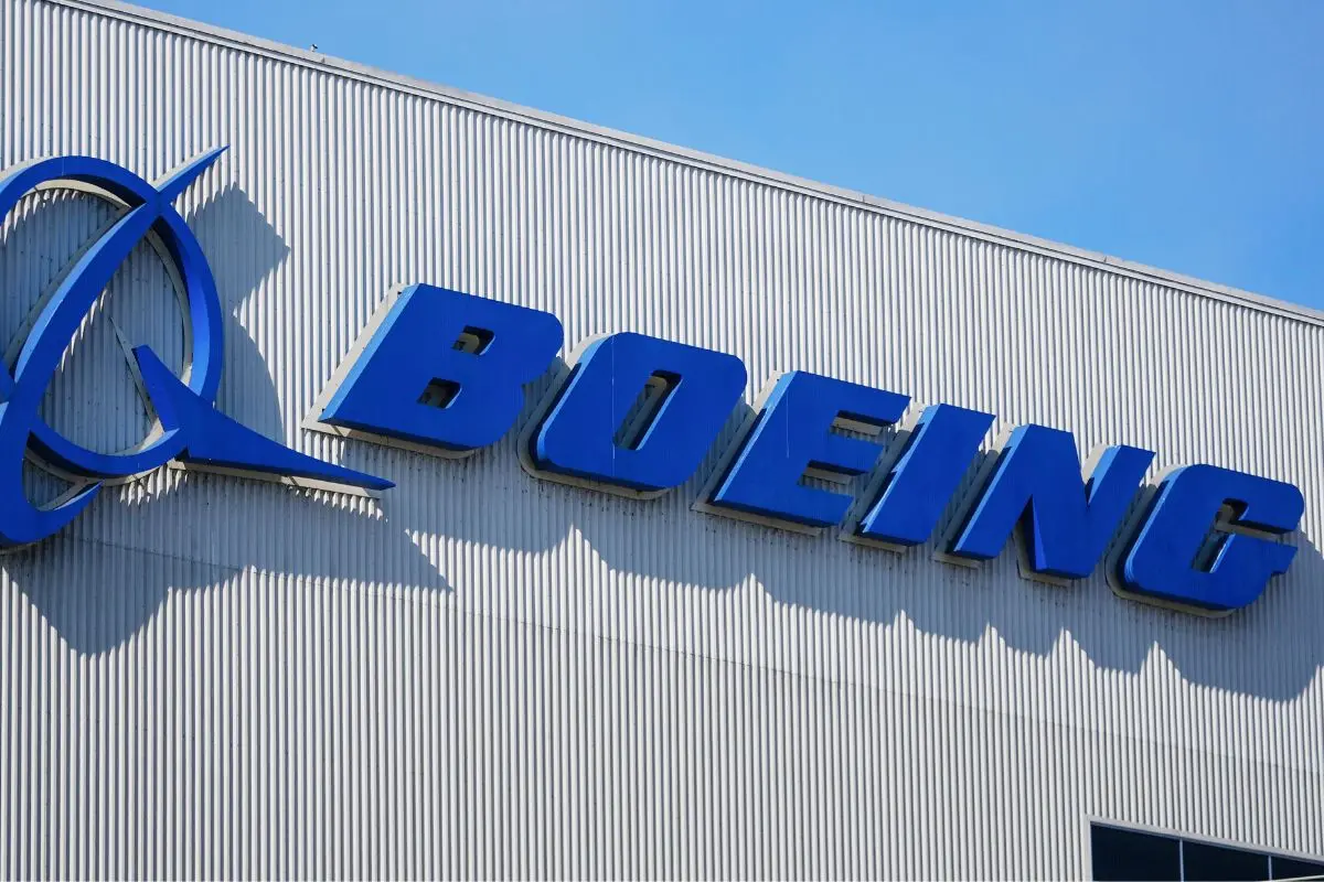The Boeing logo is displayed at the company's factory in Renton, Wash. (AP Photo/Lindsey Wasson, File)