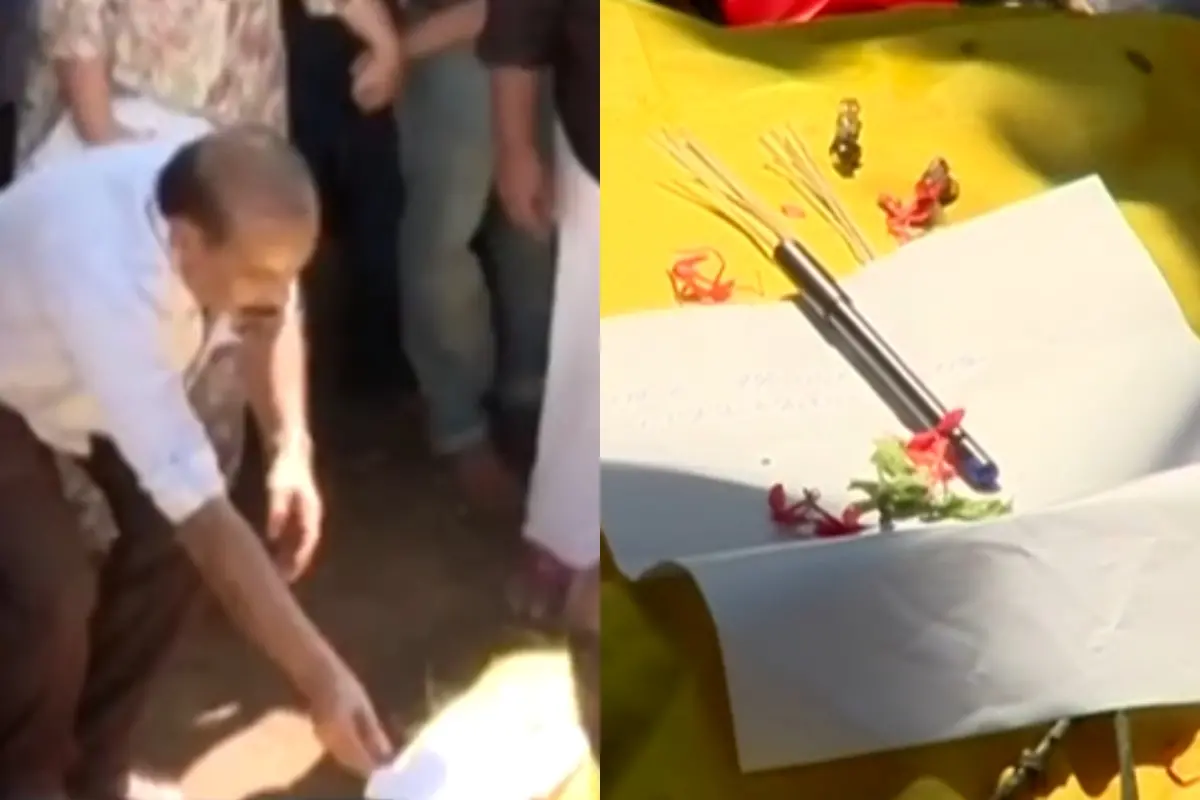 Sathyan Anthikkad placing a pen and paper on the pyre of actor Sreenivasan | Photo: Screengrab, Mathrubhumi News