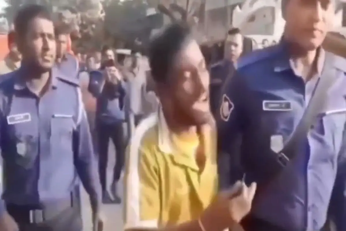 Hindu rickshaw puller Gobinda Biswas (Center) pleads for mercy after being falsely branded a 'RAW agent' and assaulted by a mob in Jhenaidah, Bangladesh. Screengrab: X video