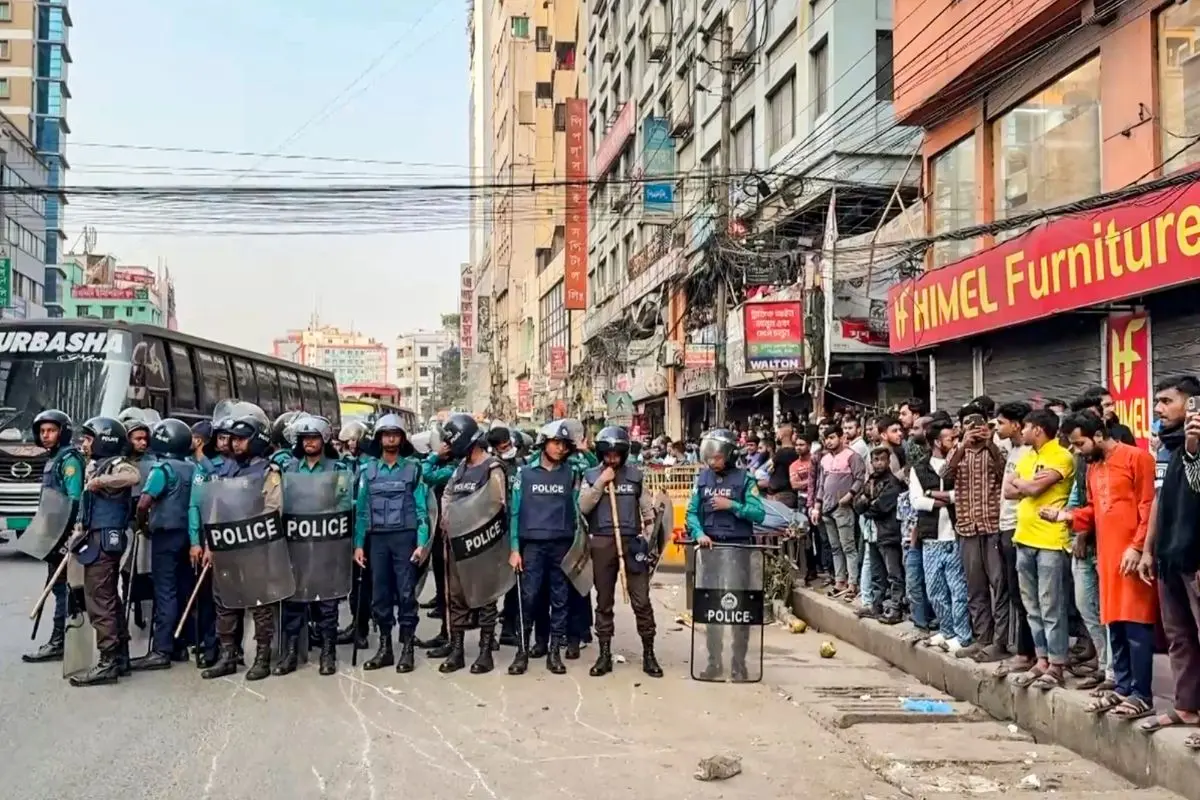 Security personnel stand guard outside the Indian High Commission as Bangladeshi groups gather for a march, in Dhaka, Bangladesh, Wednesday, Dec. 17, 2025 (Photo: PTI)