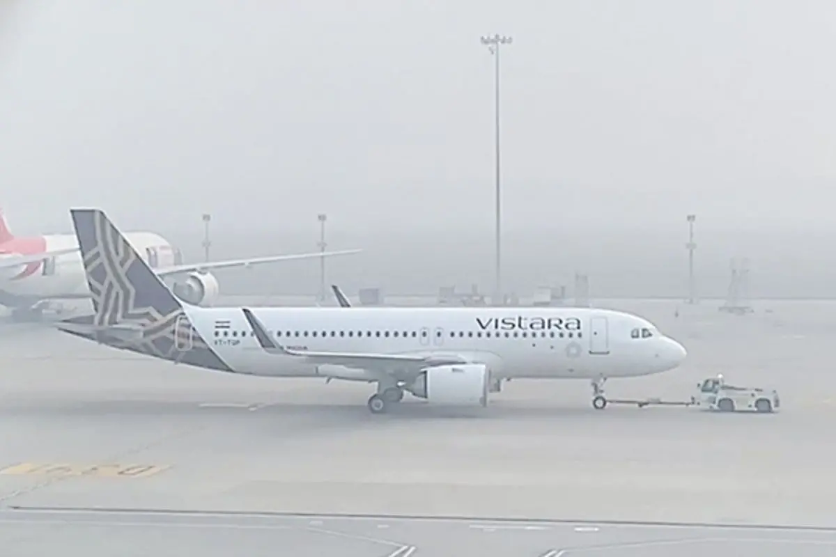 An aircraft waits to take off at the runway as dense smog reduce visibility and engulfs IGI airport, in New Delhi. (ANI Video Grab)