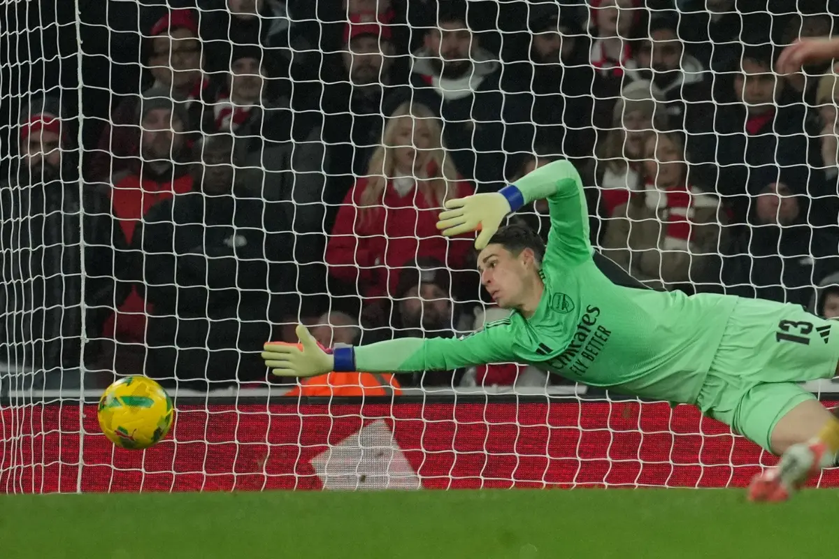 Arsenal's goalkeeper Kepa Arrizabalaga saves during the English Football League Cup quarter-final soccer match between Arsenal and Crystal Palace | Photo: AP