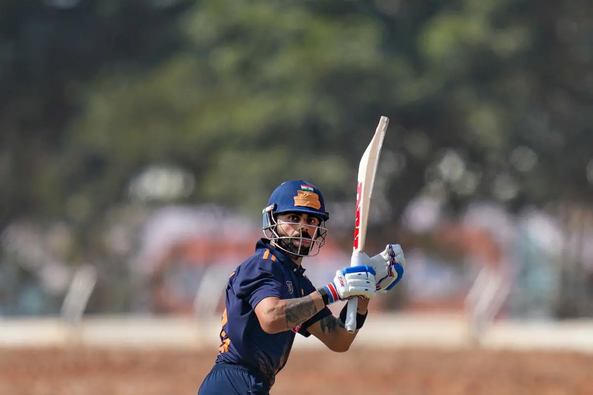 Kohli plays a shot during the Vijay Hazare Trophy 2025-26 cricket match between Andhra and Delhi. (PTI Photo/Shailendra Bhojak)